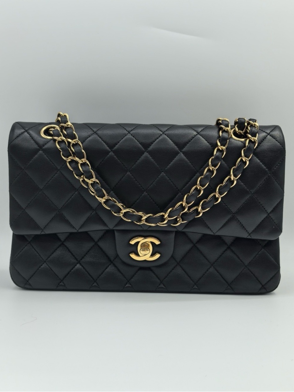 Chanel Classic Flap 11.12 double flap in black lambskin gold-tone hardware